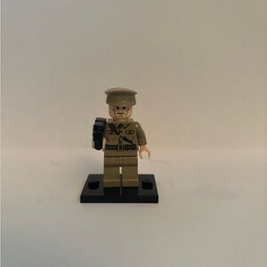 Lego Minifigure is from the Indiana Jones themed sets (iaj018)